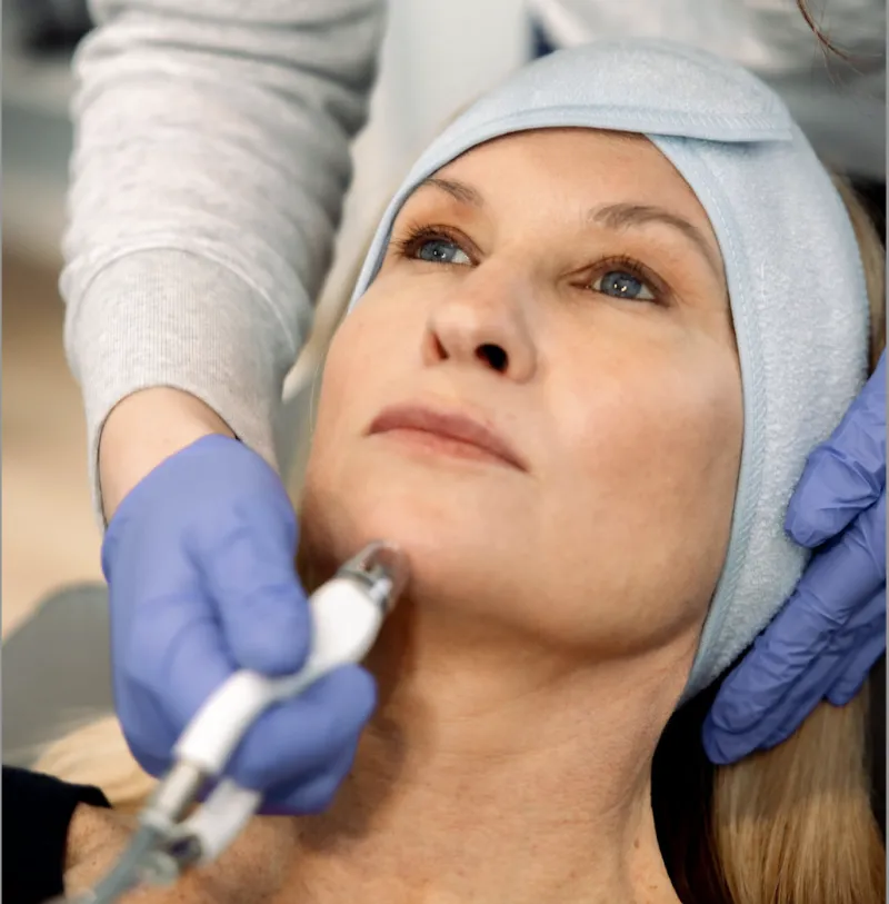 Facial treatment with a handheld device